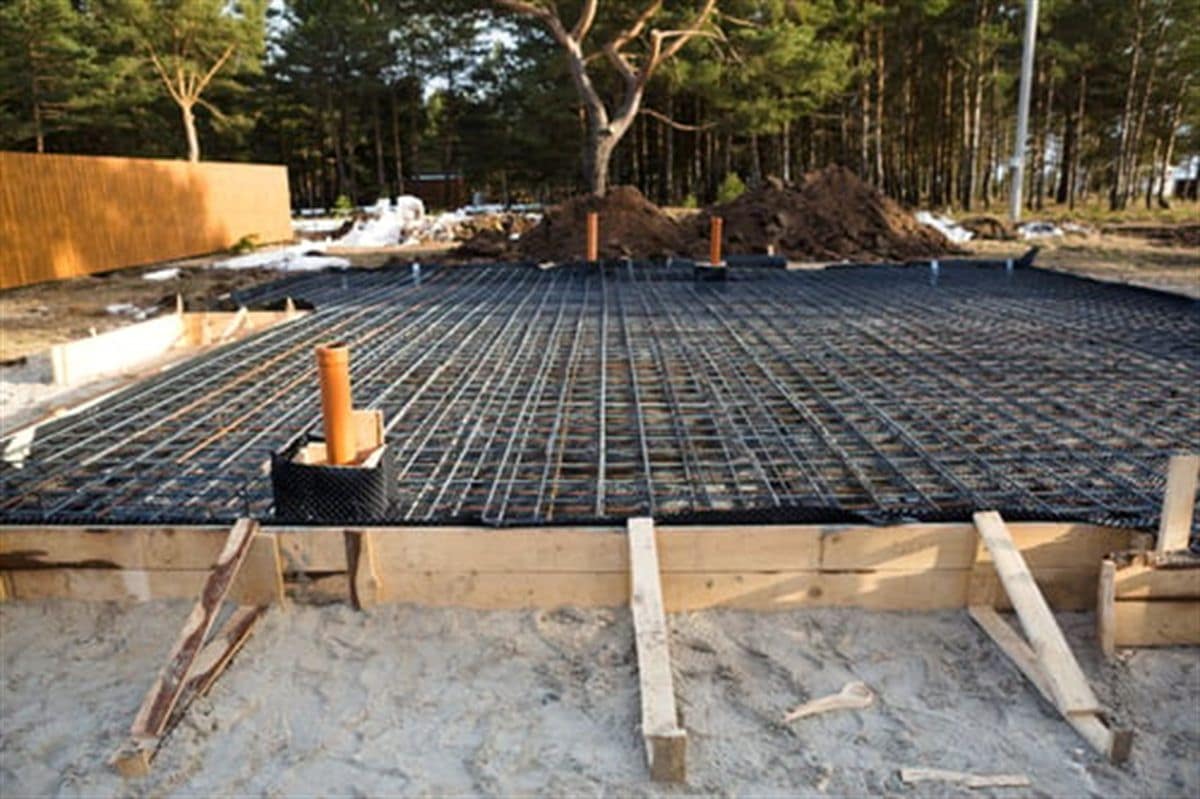 Reinforced concrete slab with rebar grid prepared for pouring on a construction site