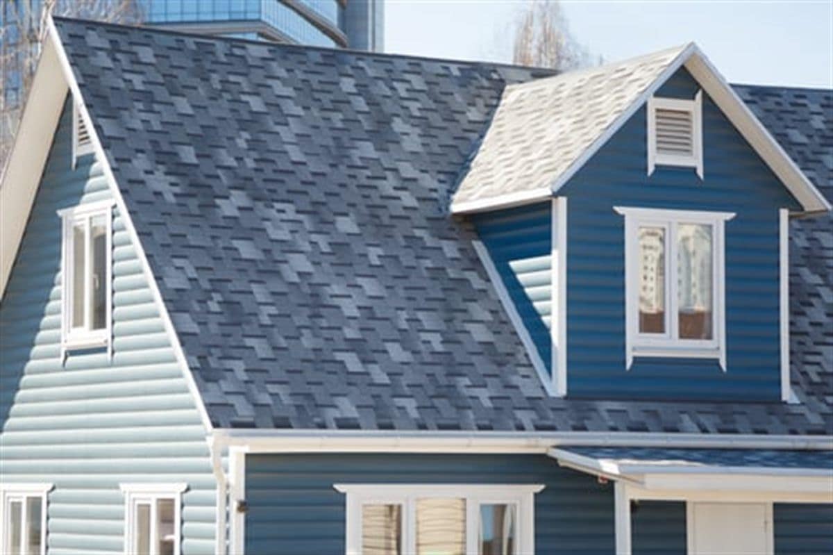 New tile roof installed on a two-story home by Concecret Construction Corp in Banning, California